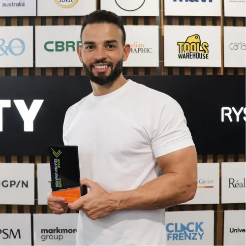 OMG specialist holding APAC Search Awards 2025 trophy for best use of AI in PPC