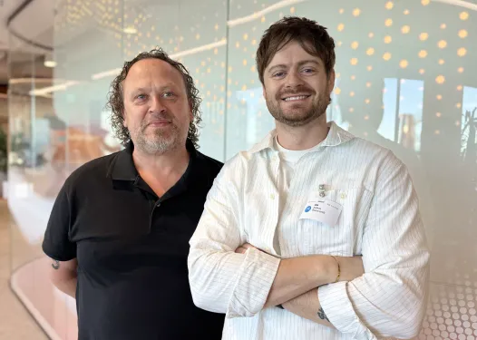 Ben, Head of Partnerships at Online Marketing Gurus, with a colleague at an industry partner event.