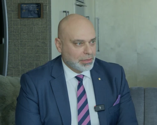 Founder of Sterling Legal, a legal client of Online Marketing Gurus, being interviewed on camera in a professional office setting.