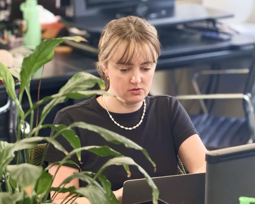 Enterprise SEO Manager Gemma working at OMG Sydney office