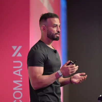 Andrew Raso, OMG Founder, speaking on stage at the Marketing Leader Summit 2026