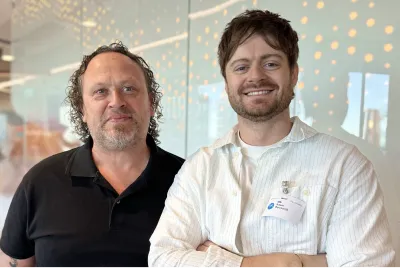 Two OMG programmatic advertising specialists at the Sydney office