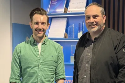 Two OMG web design and development specialists at the Sydney office