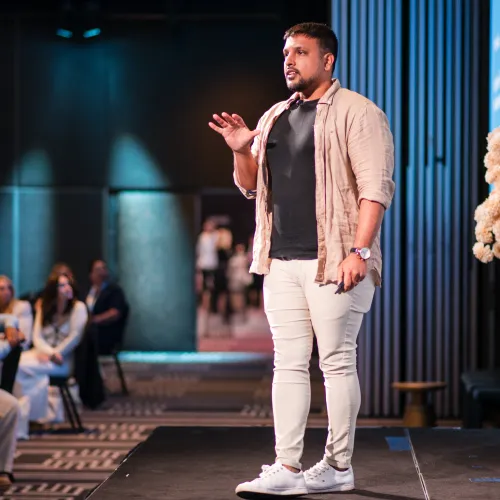Saf, OMG Chief Growth Officer, speaking to the audience at Aesthetic Business Masters